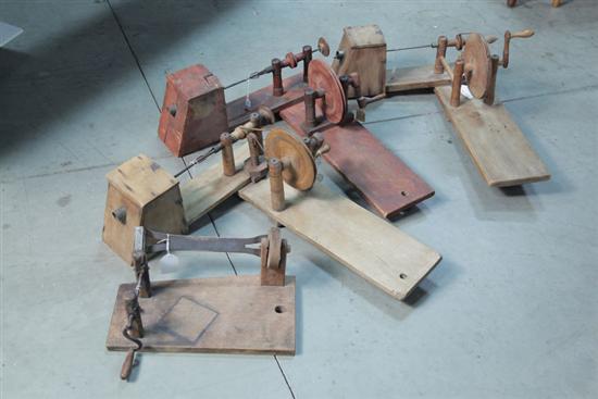 FOUR WOODEN APPLE PEELERS.