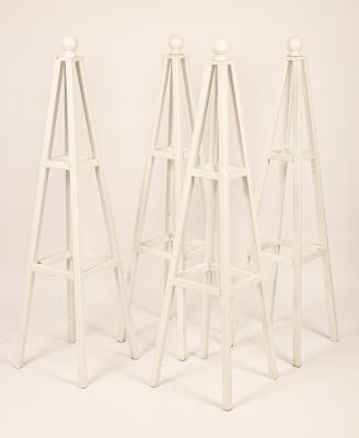 Four wooden painted garden plant