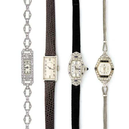 Four Wristwatches 	 