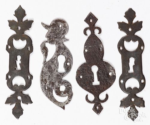 FOUR WROUGHT IRON KEYHOLE
