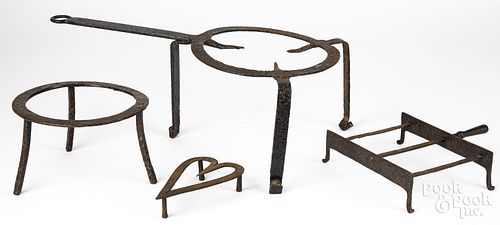 FOUR WROUGHT IRON TRIVETS, 19TH
