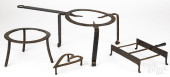 FOUR WROUGHT IRON TRIVETS, 19T