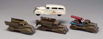Four Wyandotte trucks: white