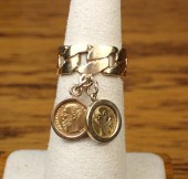 FOURTEEN KARAT GOLD BAND WITH