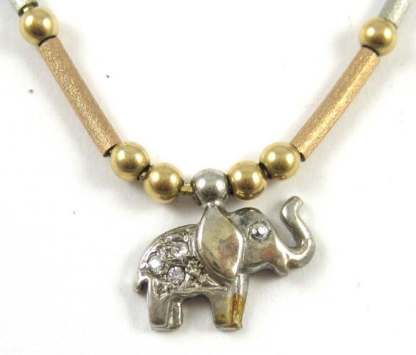 FOURTEEN KARAT GOLD BRACELET. The