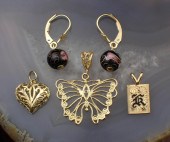 FOURTEEN KARAT GOLD EARRINGS A