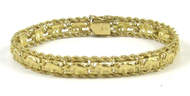 FOURTEEN KARAT GOLD ELEPHANT