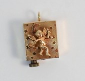 FOURTEEN KARAT GOLD MUSIC BOX