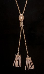 FOURTEEN KARAT GOLD SLIDE NECK
