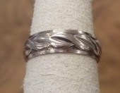 FOURTEEN KARAT WHITE GOLD BAND