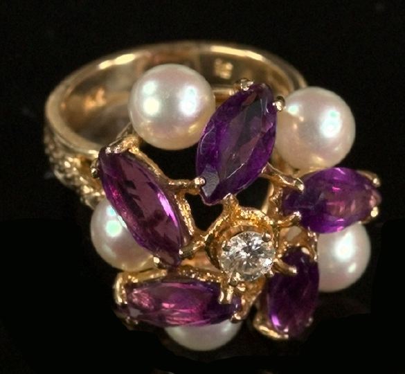 Fourteen-Karat Yellow Gold,