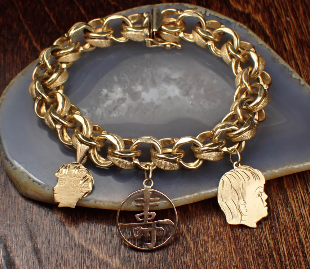 FOURTEEN KARAT YELLOW GOLD CHARM