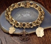 FOURTEEN KARAT YELLOW GOLD CHA