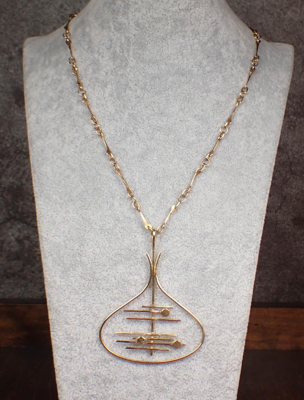 FOURTEEN KARAT YELLOW GOLD