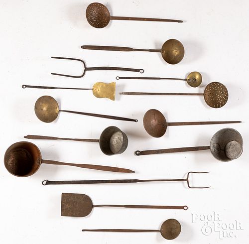 FOURTEEN LONG HANDLED IRON