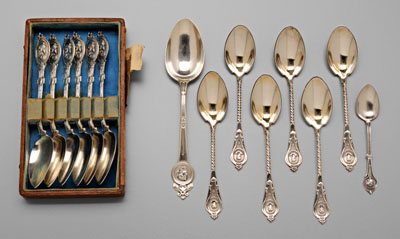 Fourteen Medallion silver spoons: