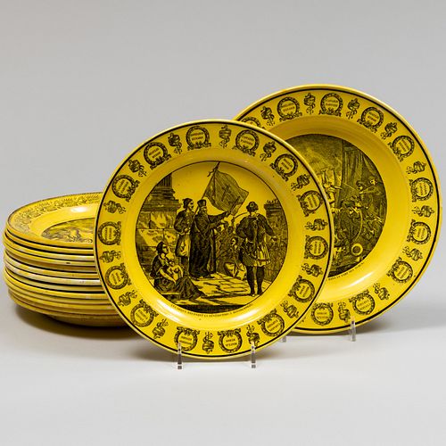 FOURTEEN YELLOW CRIEL PLATES AND