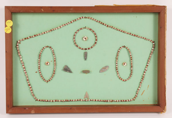 Frame of 4 flint arrowheads,