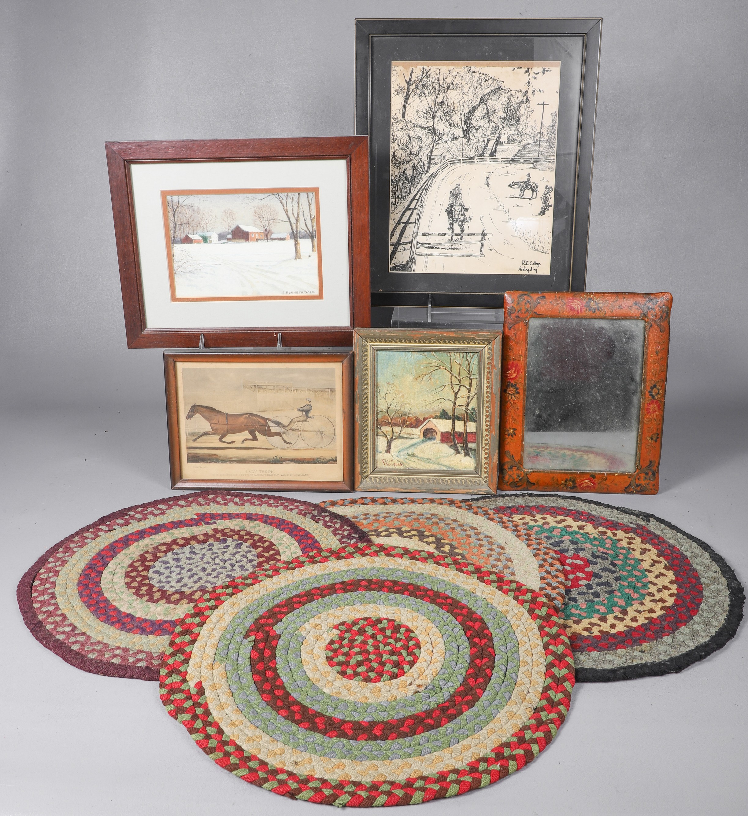 Framed art and rag rugs to