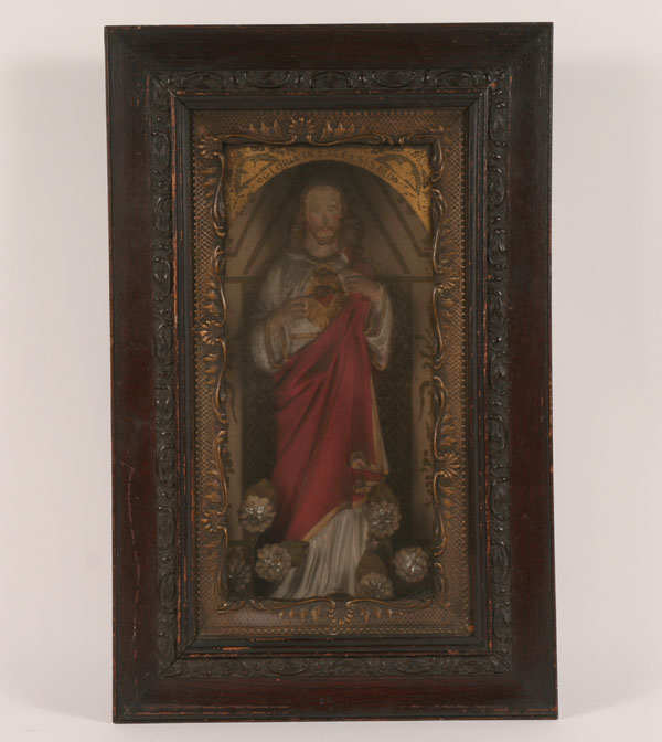 Framed religious statue of