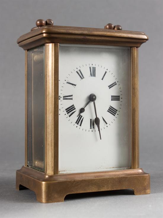 French brass and beveled glass