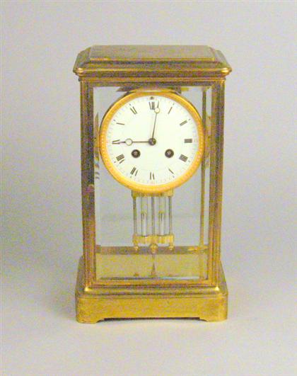 French brass and beveled glass
