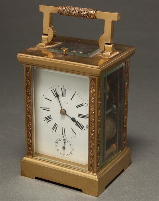 French brass and beveled glass