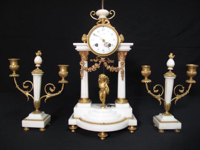 French carved marble mantle clock