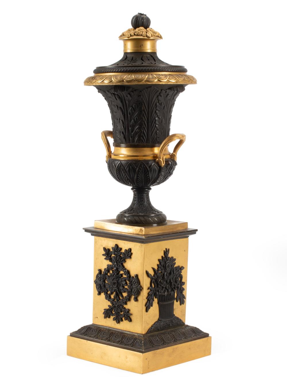 FRENCH EMPIRE GILT AND PATINATED