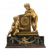 FRENCH EMPIRE GILT BRONZE AND