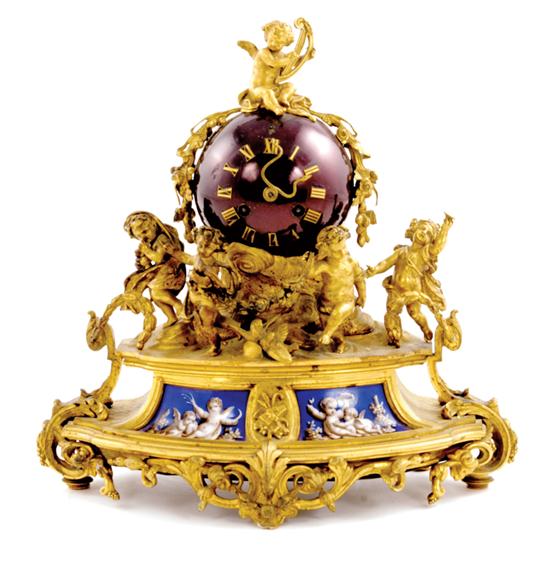 French gilt-bronze mantel clock