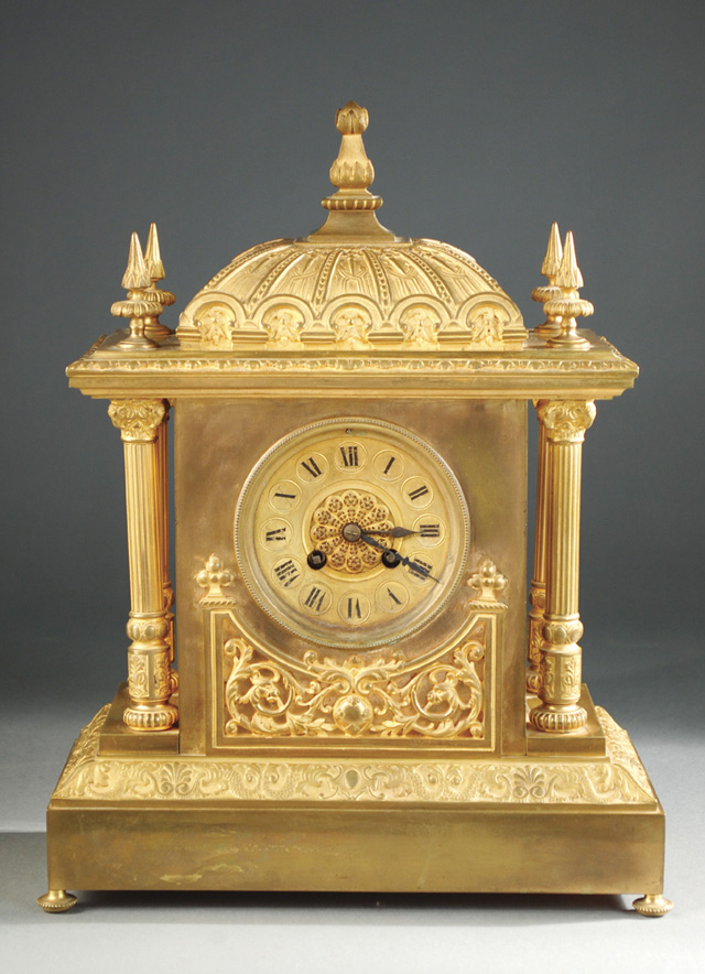 FRENCH GILT BRONZE SHELF CLOCK.