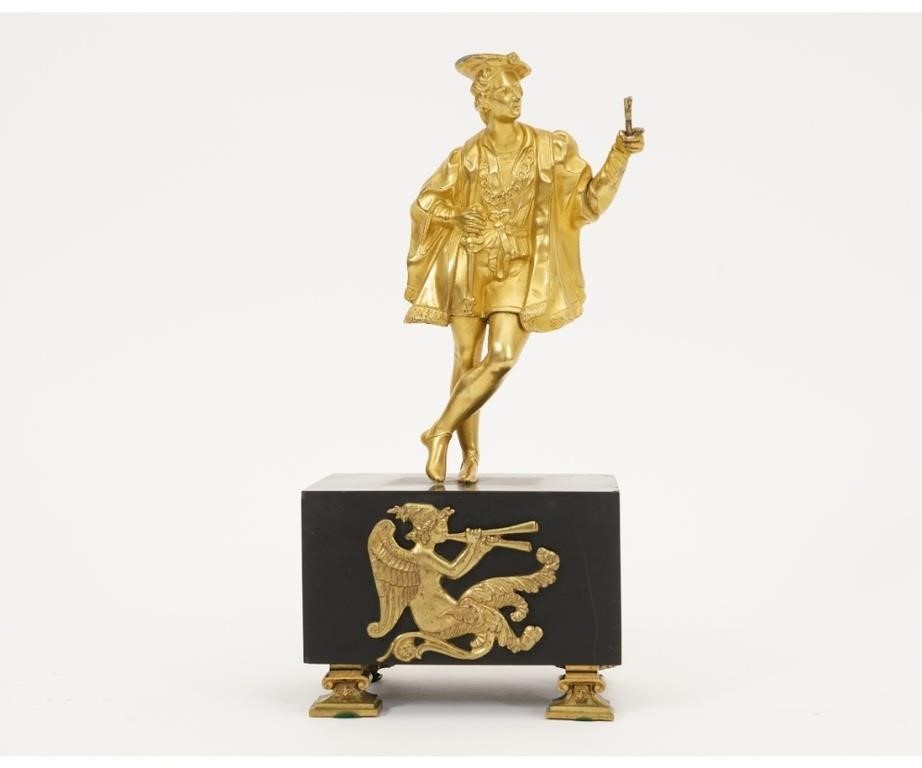French gilt metal watch holder on a