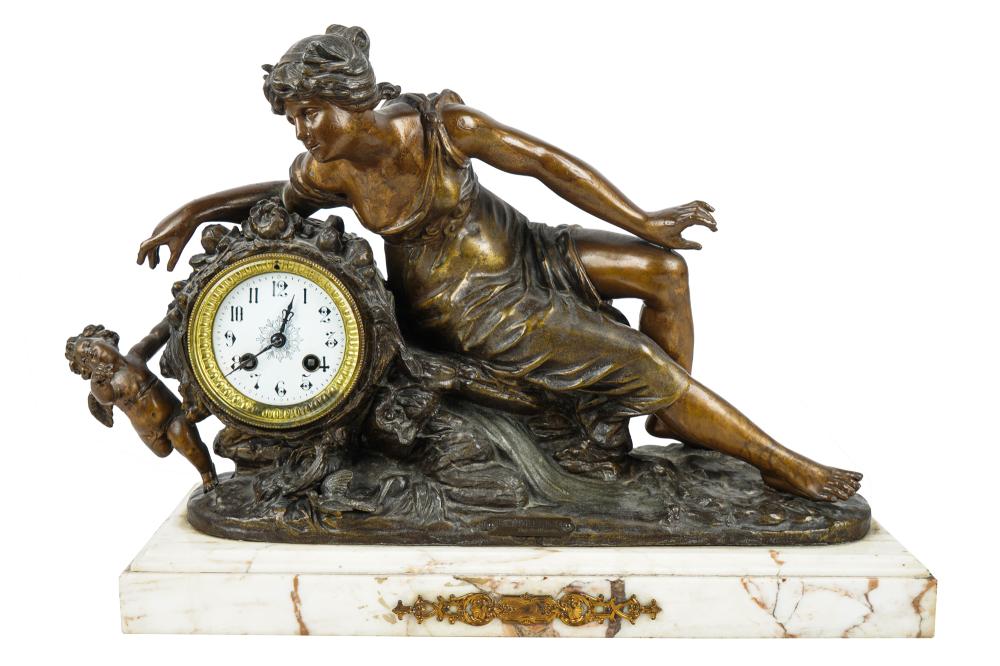 FRENCH METAL MANTLE CLOCKresting on