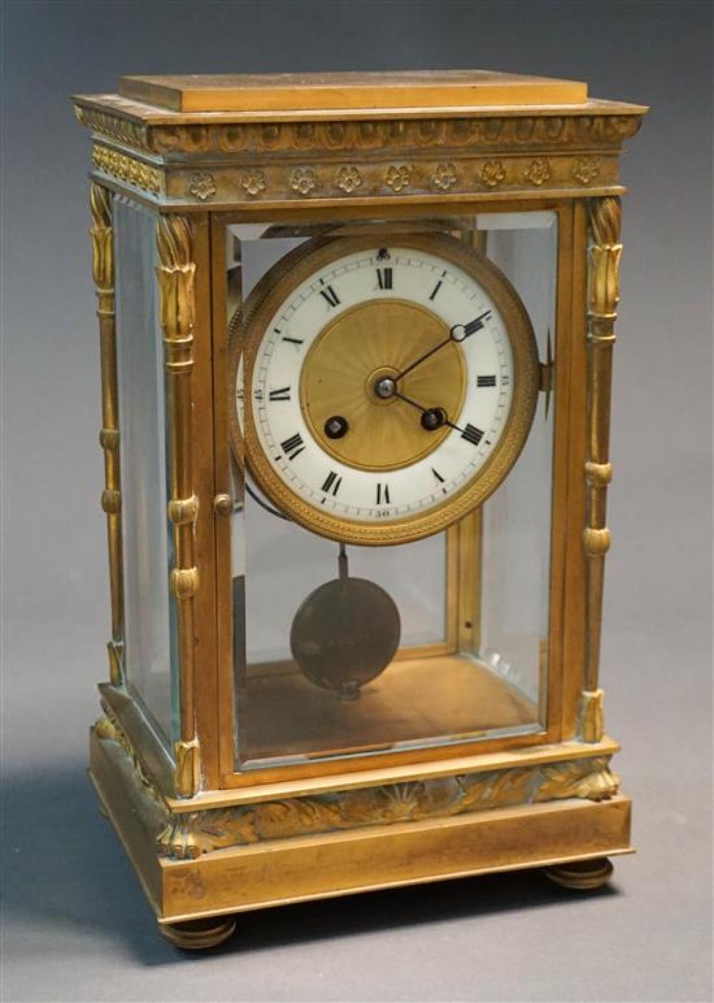FRENCH ORMOLU BEVEL GLASS CLOCK,