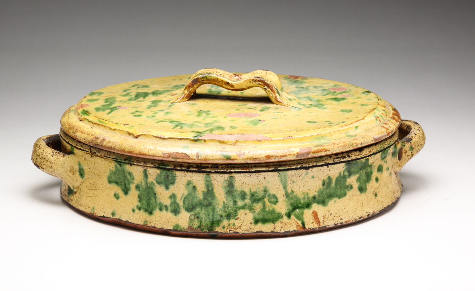 FRENCH REDWARE POACHING DISH.