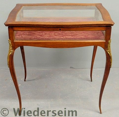 French style curio table with brass