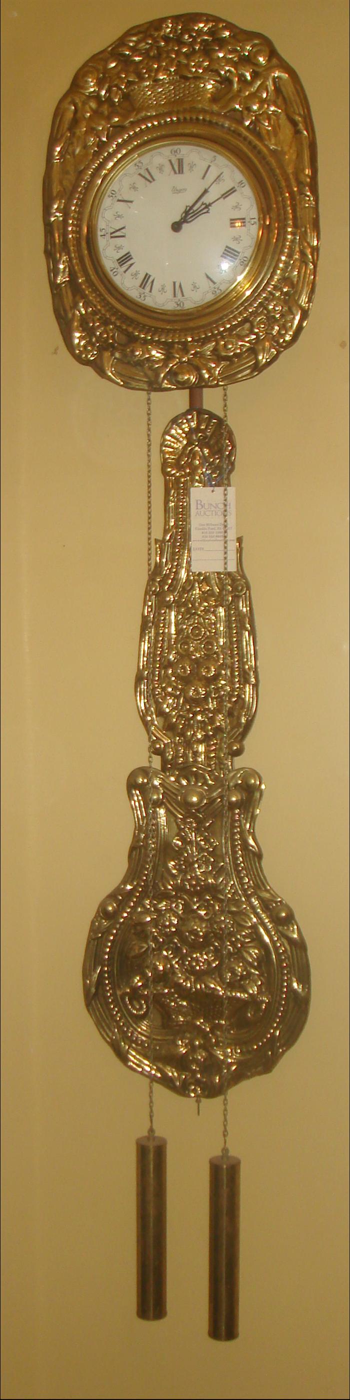 French wag on wall clock with
