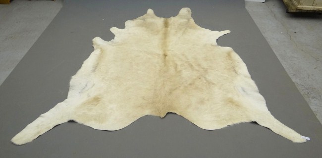 Fur rug.