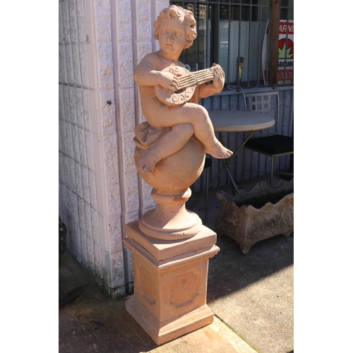 Garden concrete statue of putti