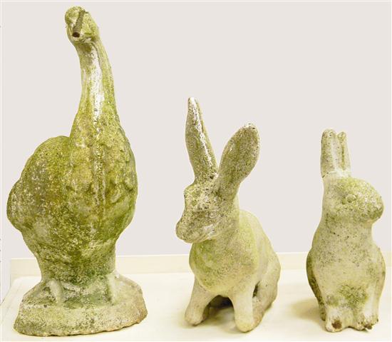 Garden sculptures: a pair of carved