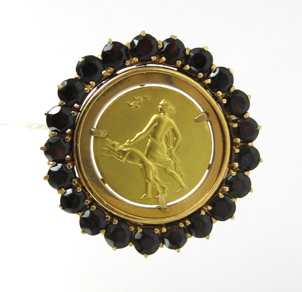GARNET AND EIGHTEEN KARAT GOLD
