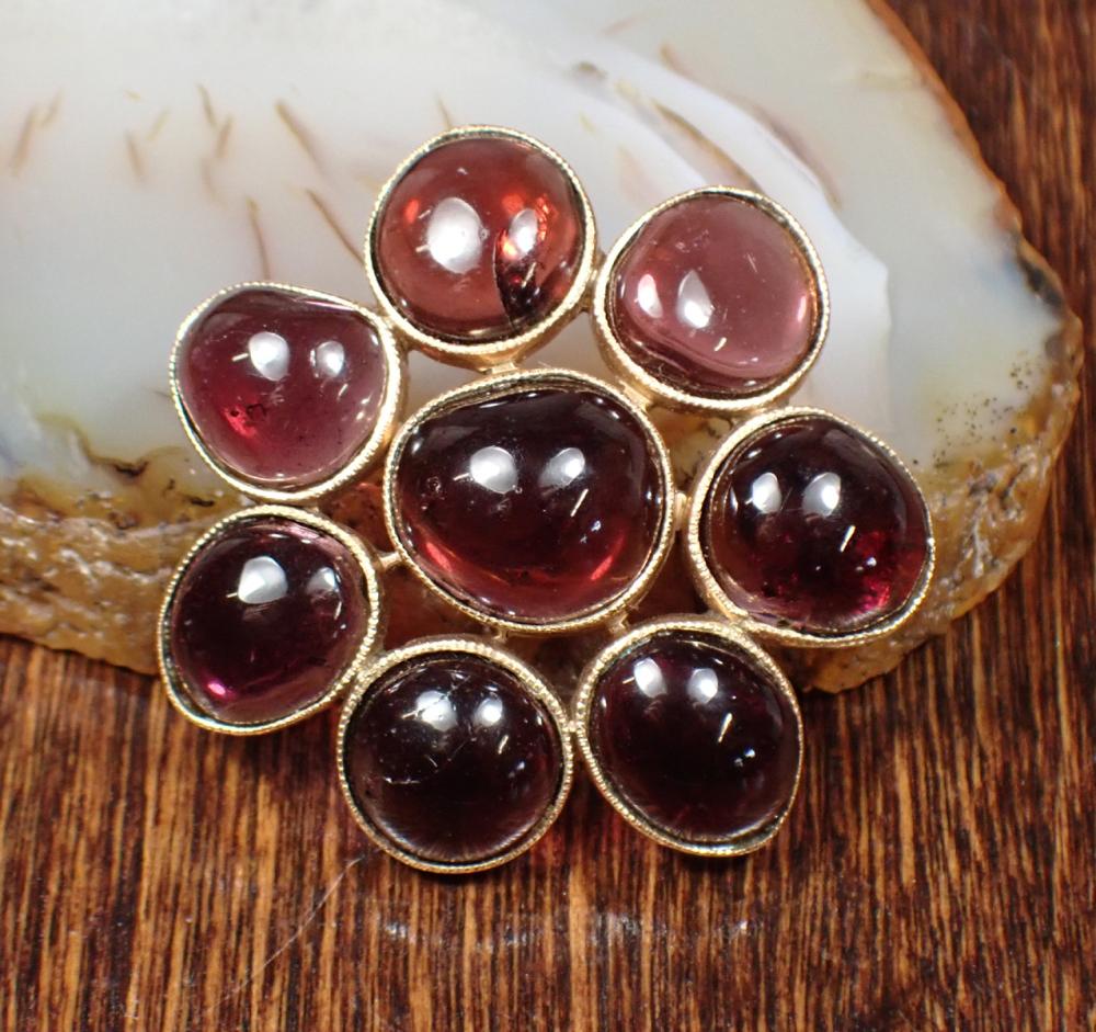 GARNET AND FOURTEEN KARAT YELLOW