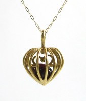 GARNET AND TEN KARAT GOLD PEND