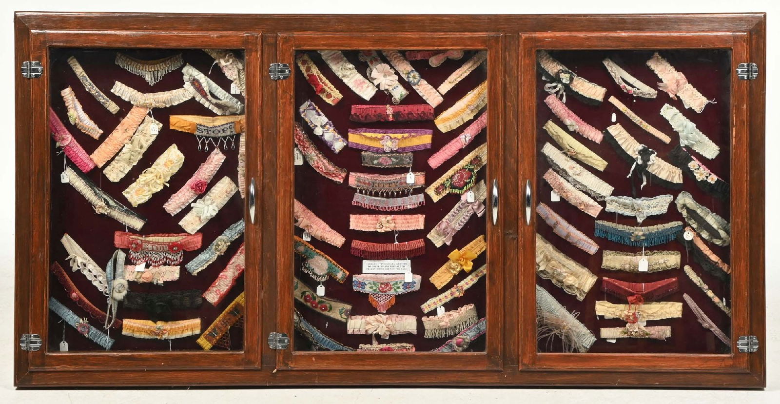 GARTERS DISPLAY THREE PANEL