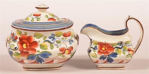 GAUDY DUTCH SUGAR BOWL AND CREAM