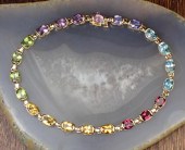 GEMSTONE AND FOURTEEN KARAT GO