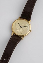 GENTLEMAN'S 18-KARAT YELLOW-GO