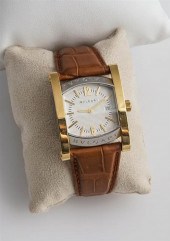GENTLEMAN'S 18-KARAT YELLOW-GO