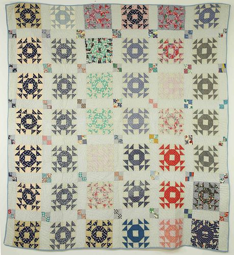 GEOMETRIC PATCHWORK QUILT IN A